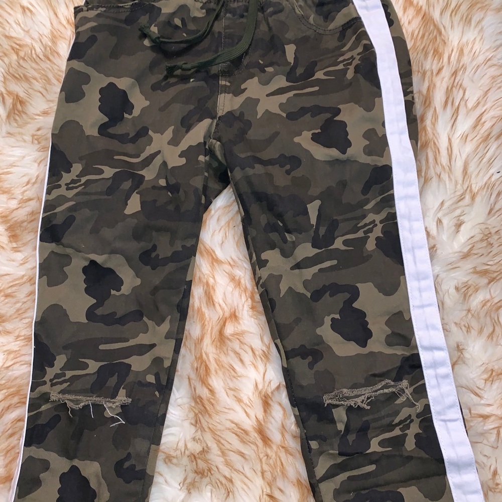 Camouflage Pants Ripped in the Knees